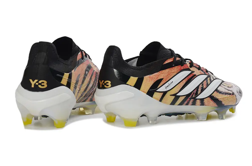 Adidas Predator 26 Elite FG Y-3 cleats from the side showcasing design